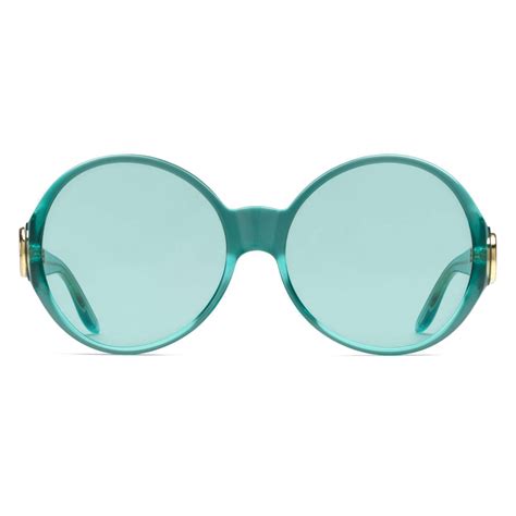 light blue gucci glasses